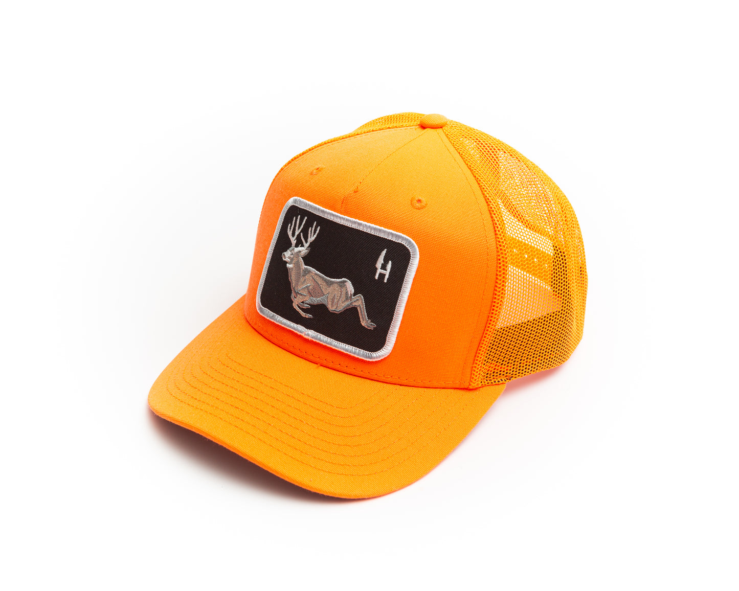 Hunt To Eat blaze orange trucker cap decorated with a beautiful embroidered patch of a bounding Mule deer buck. The patch has a black twill background with white merrowed border. The hat is a richardson blaze orange trucker mesh snap back. Perfect for use during gun season, safety orange.