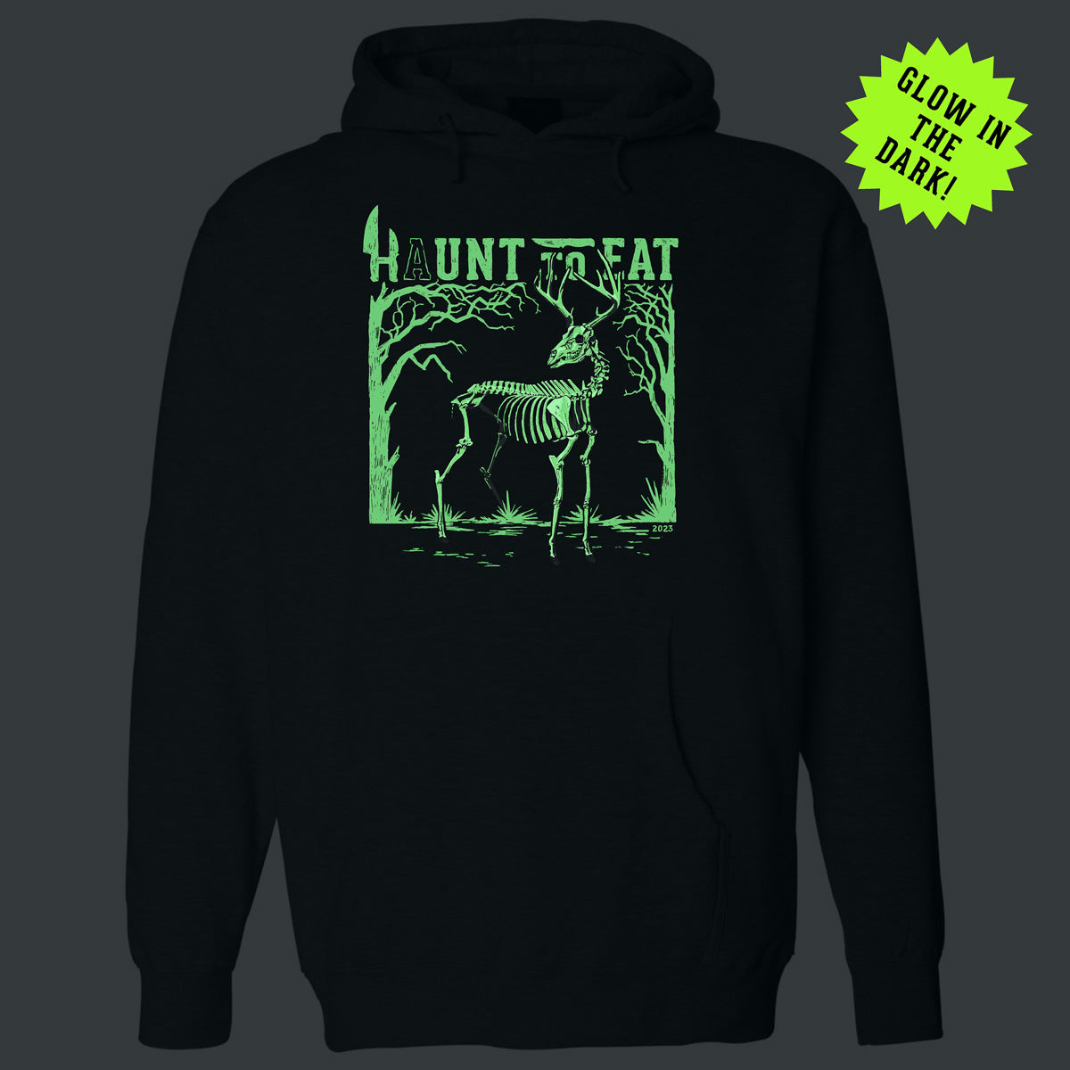 Charcoal heather hooded sweatshirt with a skeleton deer design. Haunt to eat written on the top of the design. this design is featured to have glow in the dark pigments.